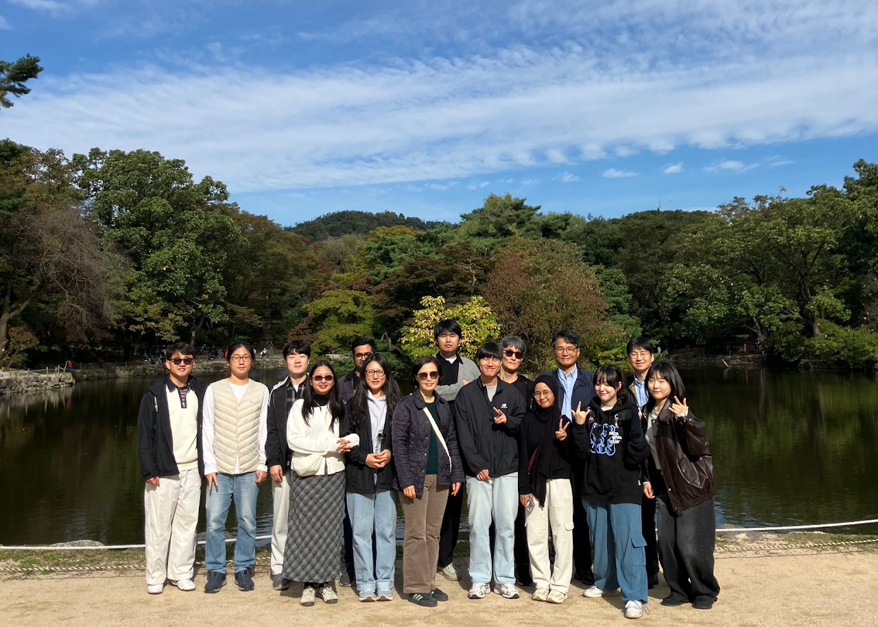 Lab group photo by the pond on Autumn Sports Day 2025